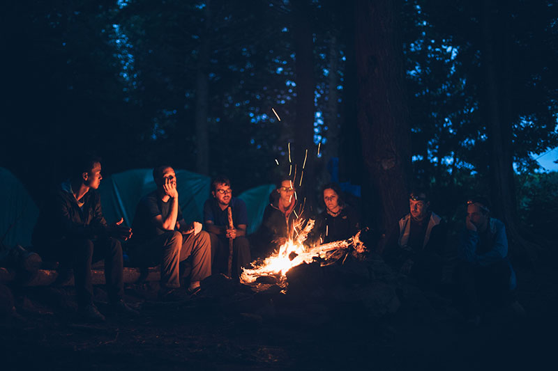 guests-around-campfire